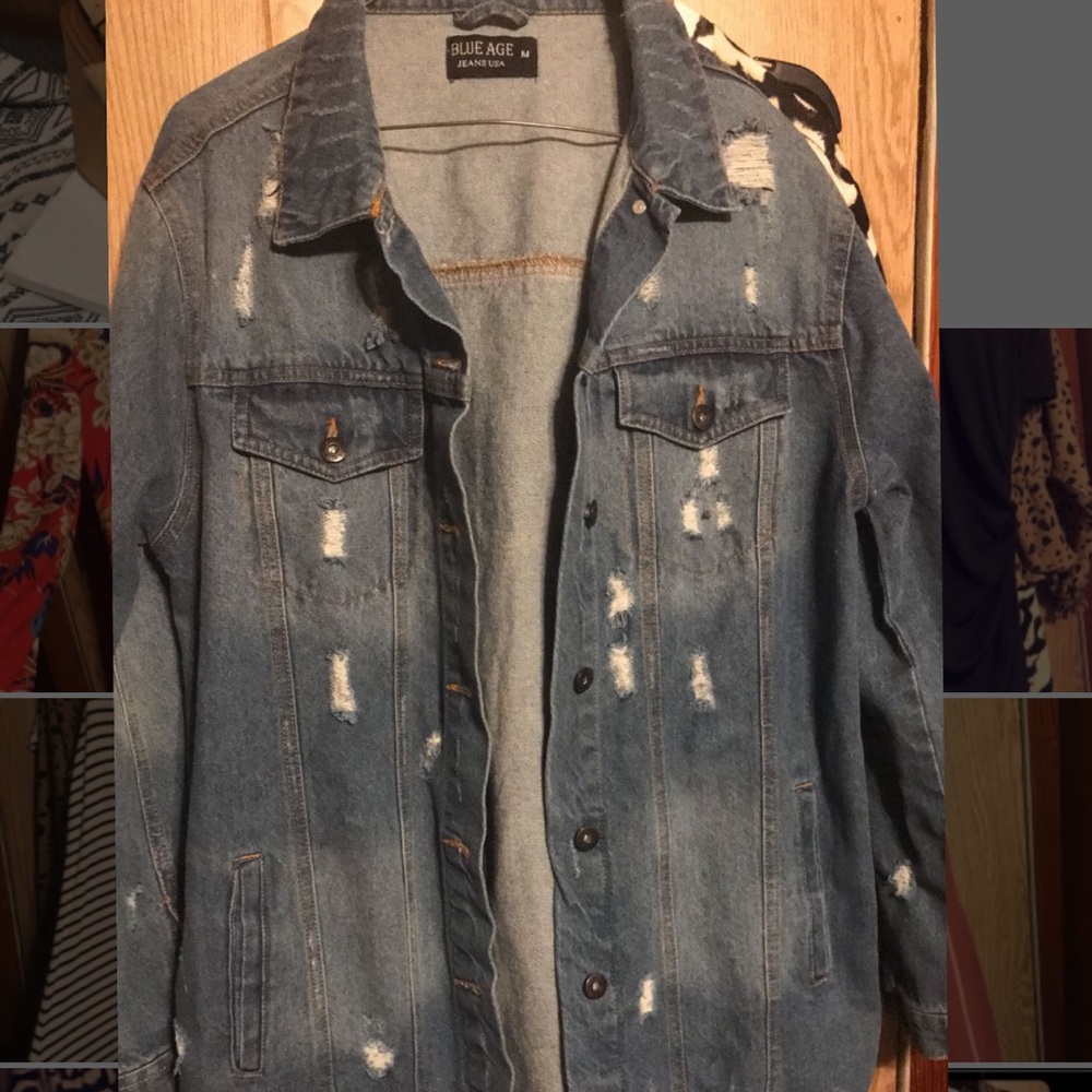 Distressed Blue Jean long jacket. Size medium but fits a little bigger.
